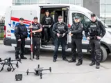 Traffic officers with drone and van