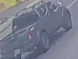Still video surveillance images of suspect pickup truck